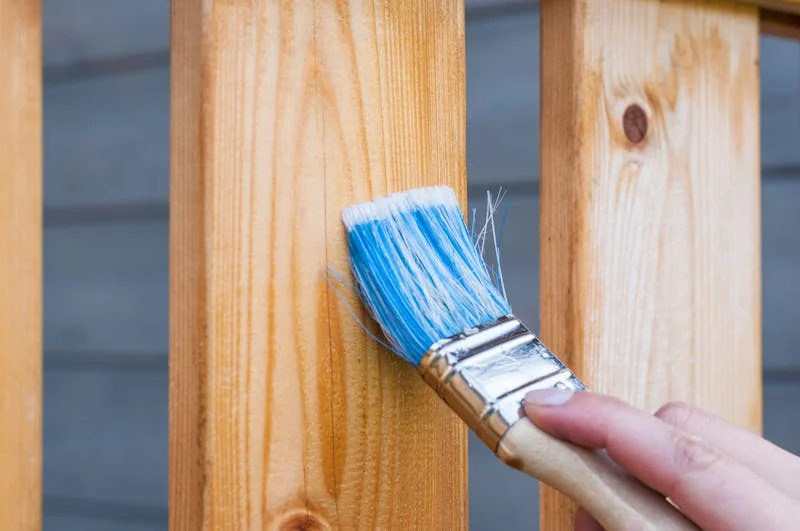 painter with brush for household insurance