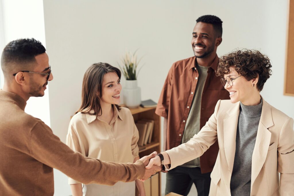 Insurance professionals having discussion in modern office environment